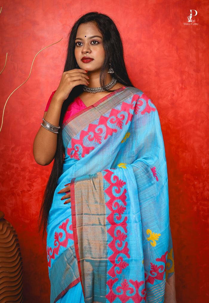 Blue Applique Work Saree with Pink Border