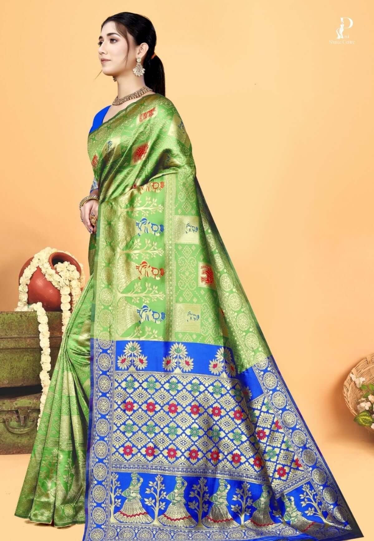 Green Gharchola Silk Saree with Blue Border