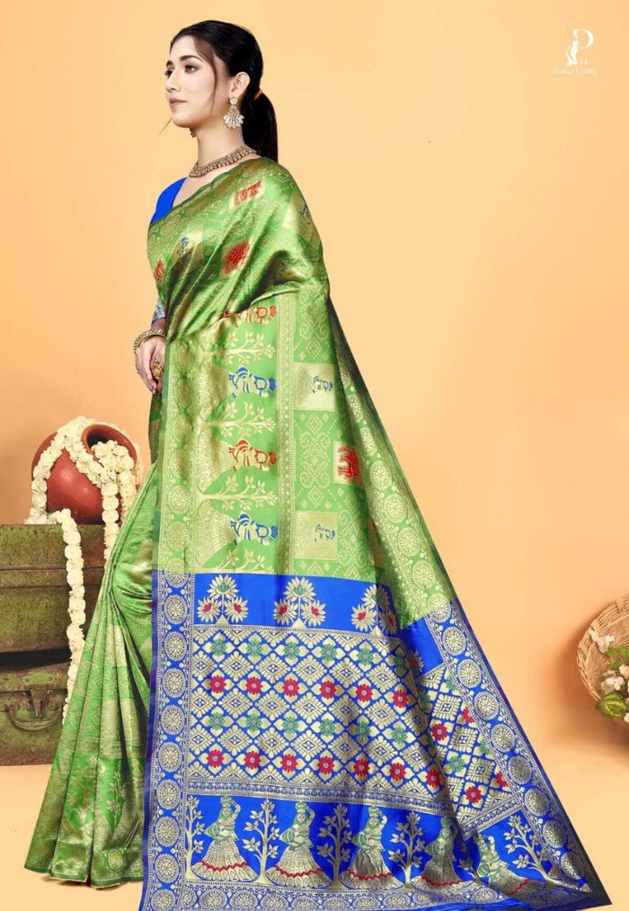 Green Gharchola Silk Saree with Blue Border
