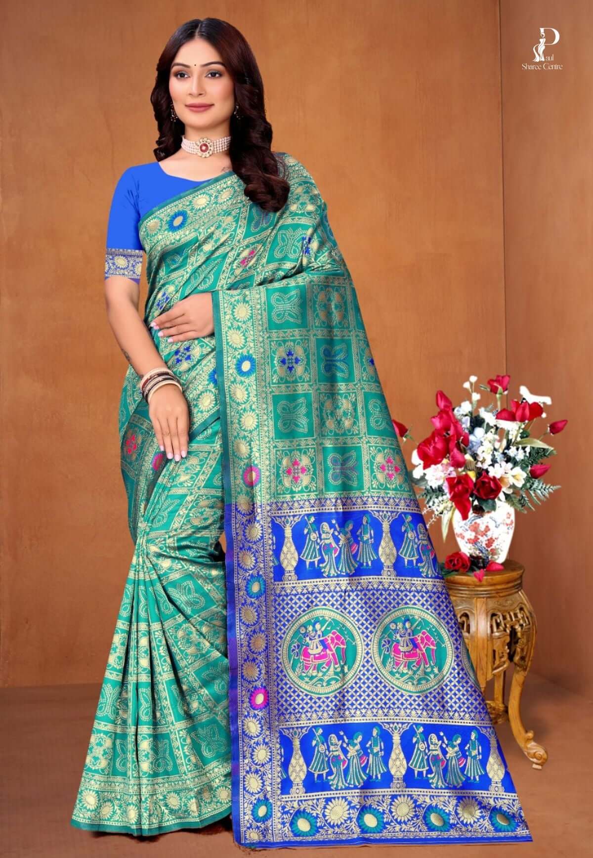 Sea Green Ethnic Motif Patola Saree with Blue Border