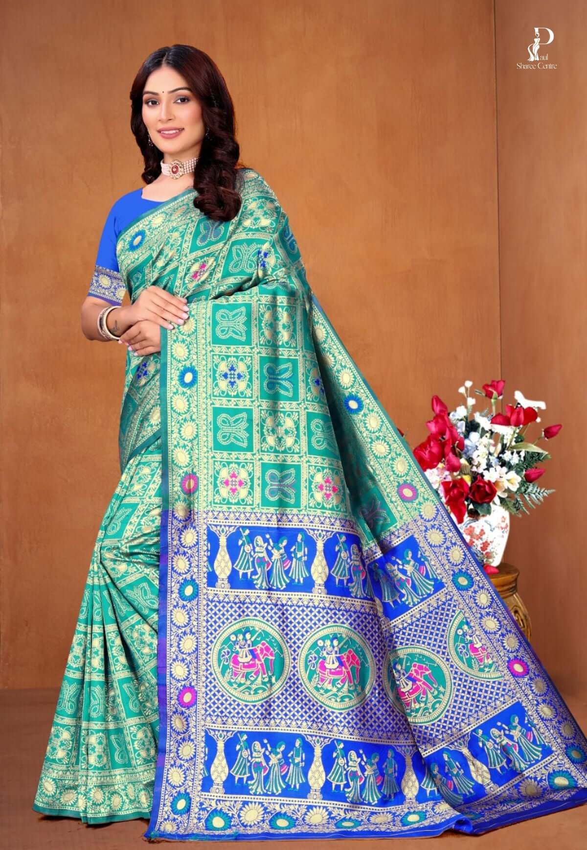 Sea Green Ethnic Motif Patola Saree with Blue Border