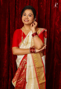 White Kanjivaram Pattu Silk with Red Border