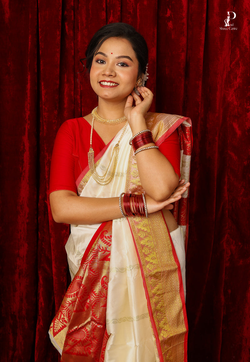 White Kanjivaram Pattu Silk with Red Border