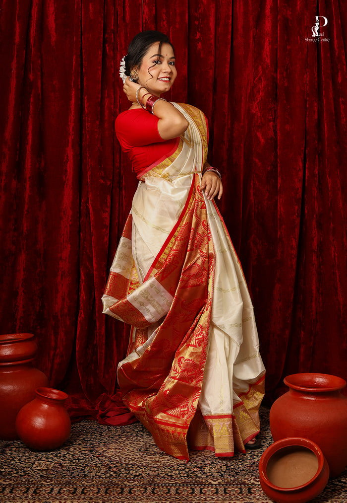 White Kanjivaram Pattu Silk with Red Border