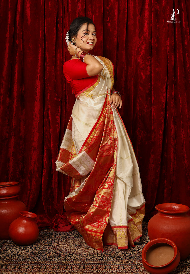 White Kanjivaram Pattu Silk with Red Border