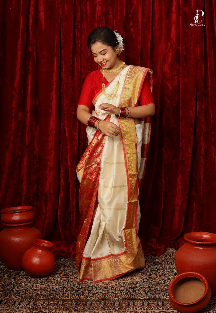 White Kanjivaram Pattu Silk with Red Border