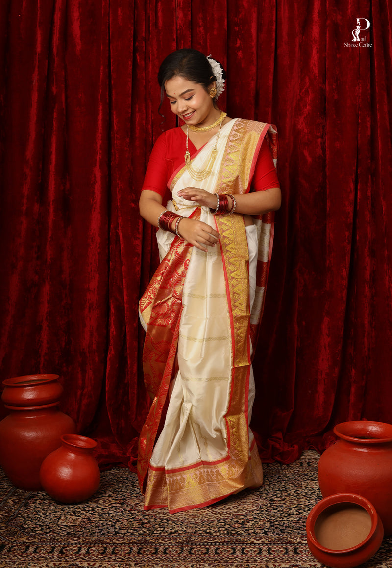White Kanjivaram Pattu Silk with Red Border