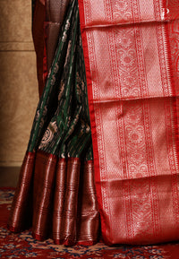 Dark Green Satin Pattu Kanjivaram Saree with Red Border