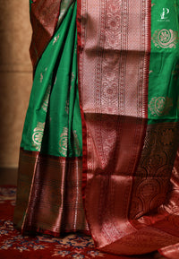 Green Satin Pattu Kanjivaram Saree with Red Border